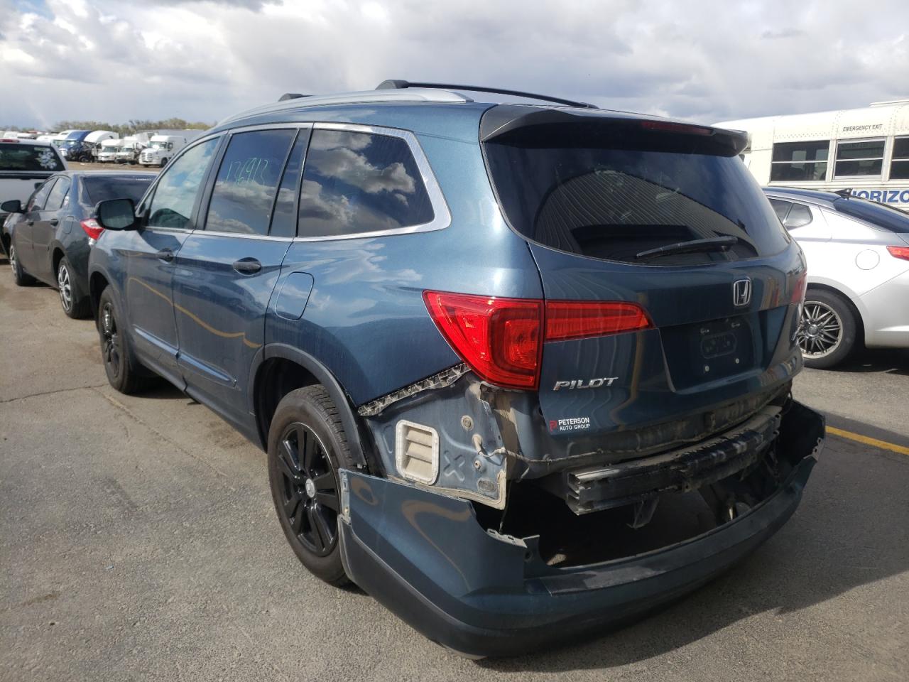 Photo 3 from auction – 2016 HONDA PILOT LX with VIN 5FNYF6H15GB051653