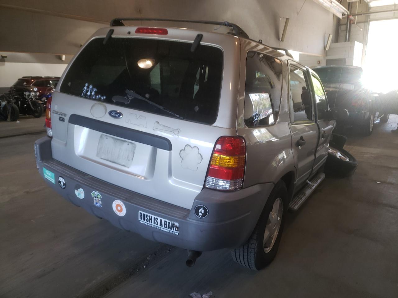 Photo 4 from auction – 2001 FORD ESCAPE XLS with VIN 1FMYU01B21KB73334