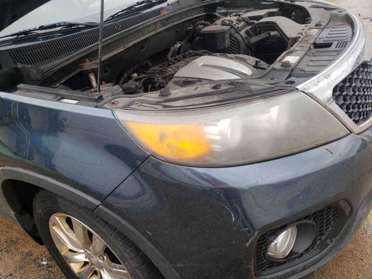 Photo 9 from auction – 2011 KIA SORENTO EX with VIN 5XYKU4A29BG048131