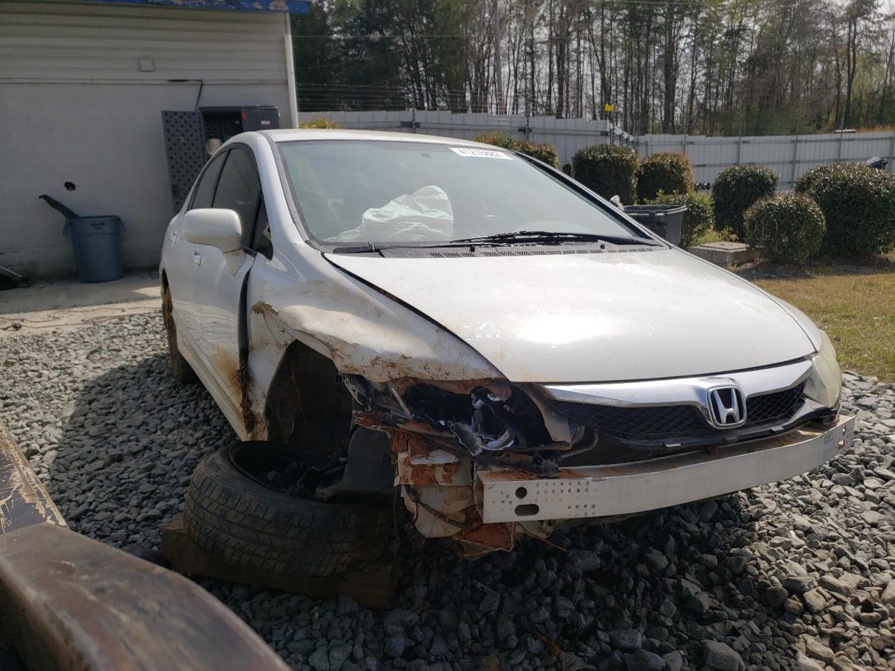 HONDA CIVIC LX 2011 with VIN 19XFA1F52BE031907 - Photo from auction