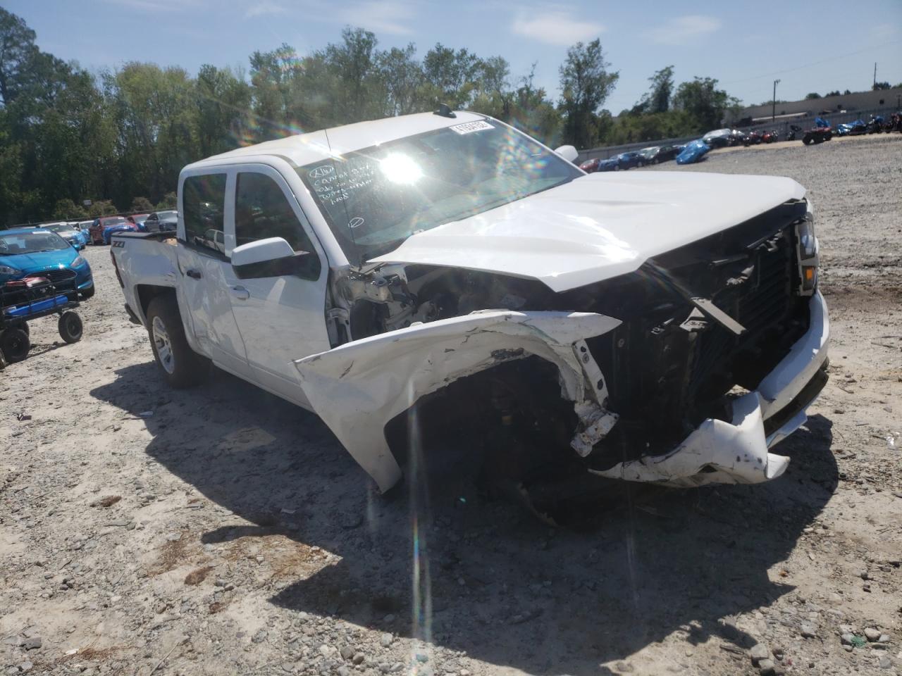CHEVROLET SILVERADO 2018 with VIN 3GCUKREC9JG610656 - Photo from auction