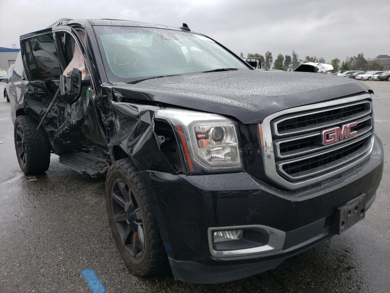 GMC YUKON SLT 2017 with VIN 1GKS2BKC0HR368423 - Photo from auction