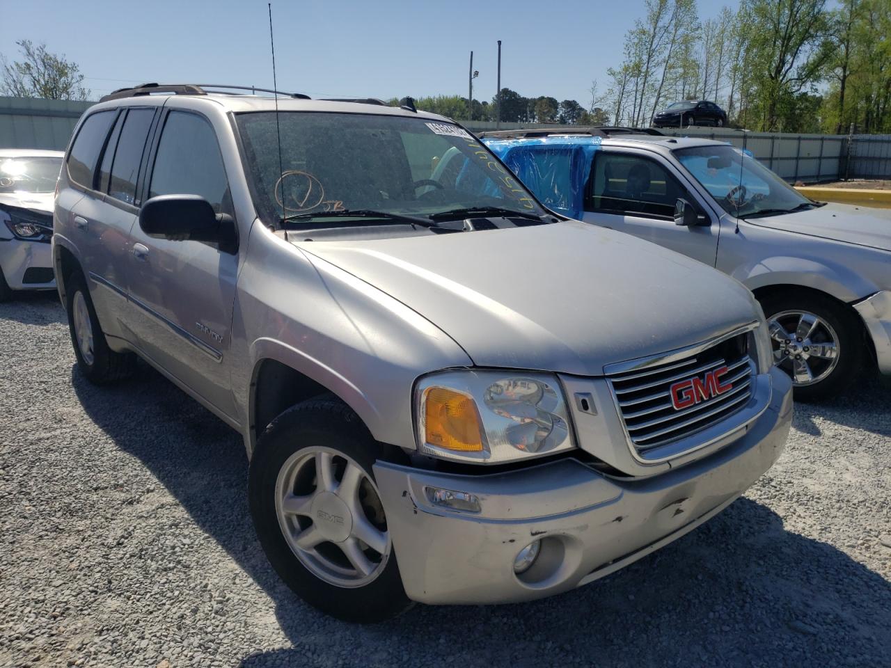 GMC ENVOY 2006 with VIN 1GKDS13S862174382 - Photo from auction