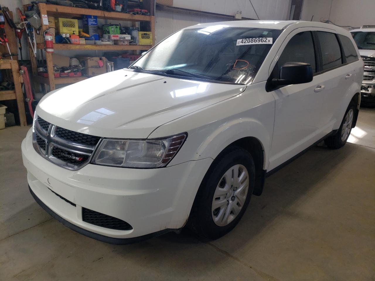 Photo 2 from auction – 2014 DODGE JOURNEY SE with VIN 3C4PDCAB1ET148365