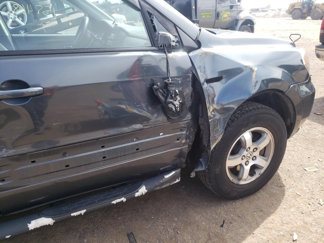 Photo 9 from auction – 2006 HONDA PILOT EX with VIN 2HKYF18456H504621