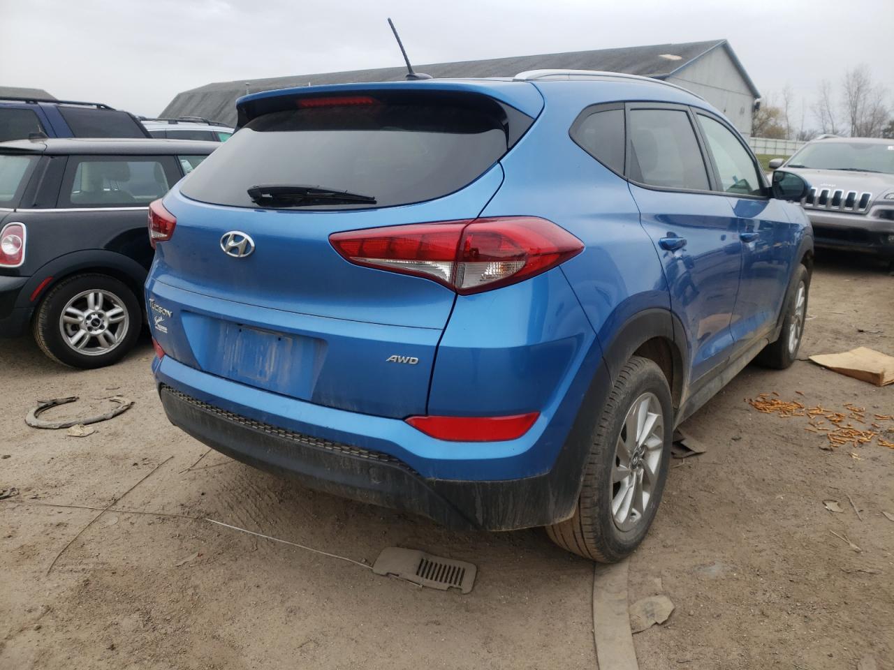 Photo 4 from auction – 2016 HYUNDAI TUCSON LIM with VIN KM8J3CA42GU230118