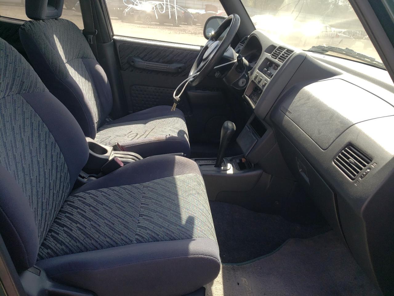 Photo 5 from auction – 1999 TOYOTA RAV4 with VIN JT3HP10V1X0215465