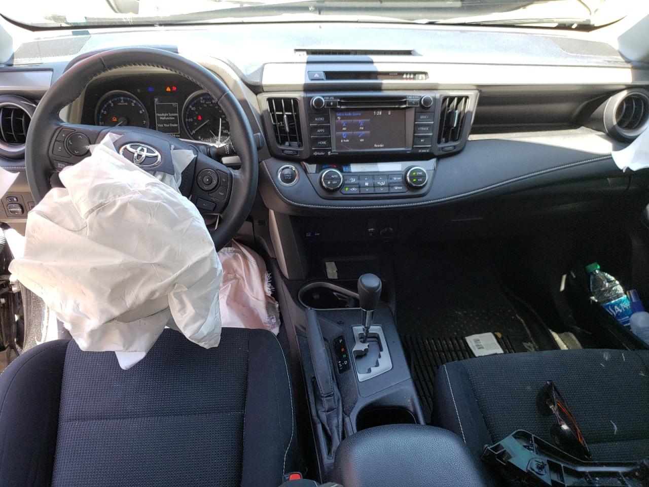 Photo 9 from auction – 2017 TOYOTA RAV4 XLE with VIN 2T3RFREV8HW661586