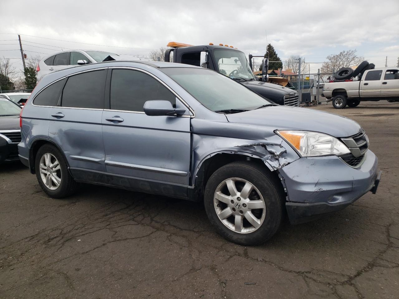 Photo 9 from auction – 2011 HONDA CR-V EXL with VIN JHLRE4H74BC027305