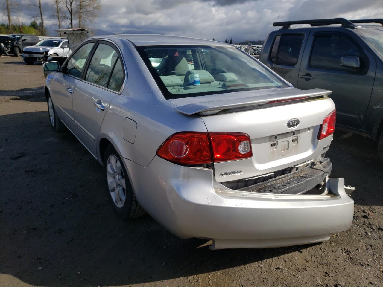 Photo 3 from auction – 2007 KIA OPTIMA LX with VIN KNAGE124775112990