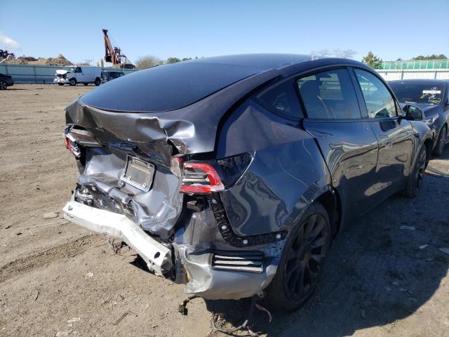 Photo 4 from auction – 2021 TESLA MODEL Y with VIN 5YJYGDEE8MF085011