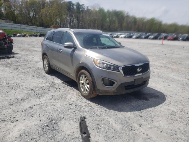 KIA SORENTO LX 2016 with VIN 5XYPG4A35GG080880 - Photo from auction