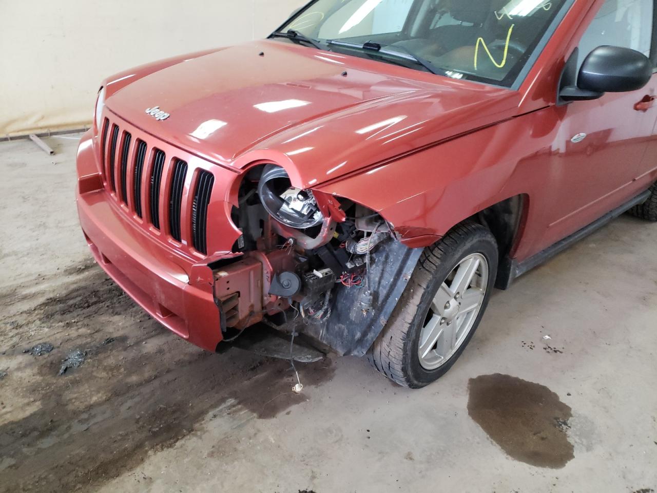 Photo 9 from auction – 2010 JEEP COMPASS SP with VIN 1J4NF4FB9AD630995
