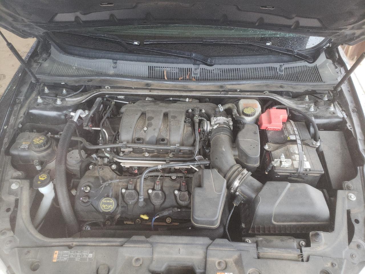 Photo 7 from auction – 2015 FORD TAURUS SEL with VIN 1FAHP2E85FG208373