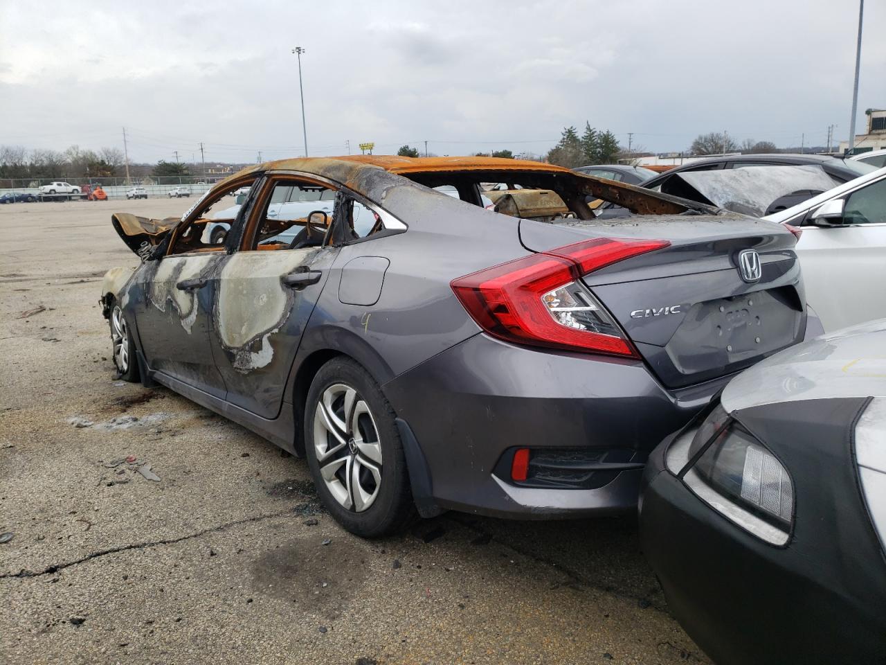 Photo 3 from auction – 2018 HONDA CIVIC LX with VIN 19XFC2F54JE018171