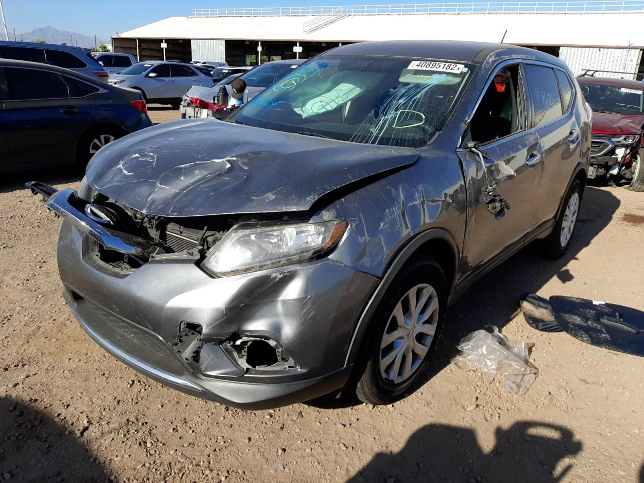 Photo 2 from auction – 2015 NISSAN ROGUE S with VIN KNMAT2MT1FP590334