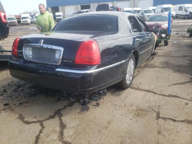 Photo 4 from auction – 2004 LINCOLN TOWN CAR U with VIN 1LNHM83W74Y682769