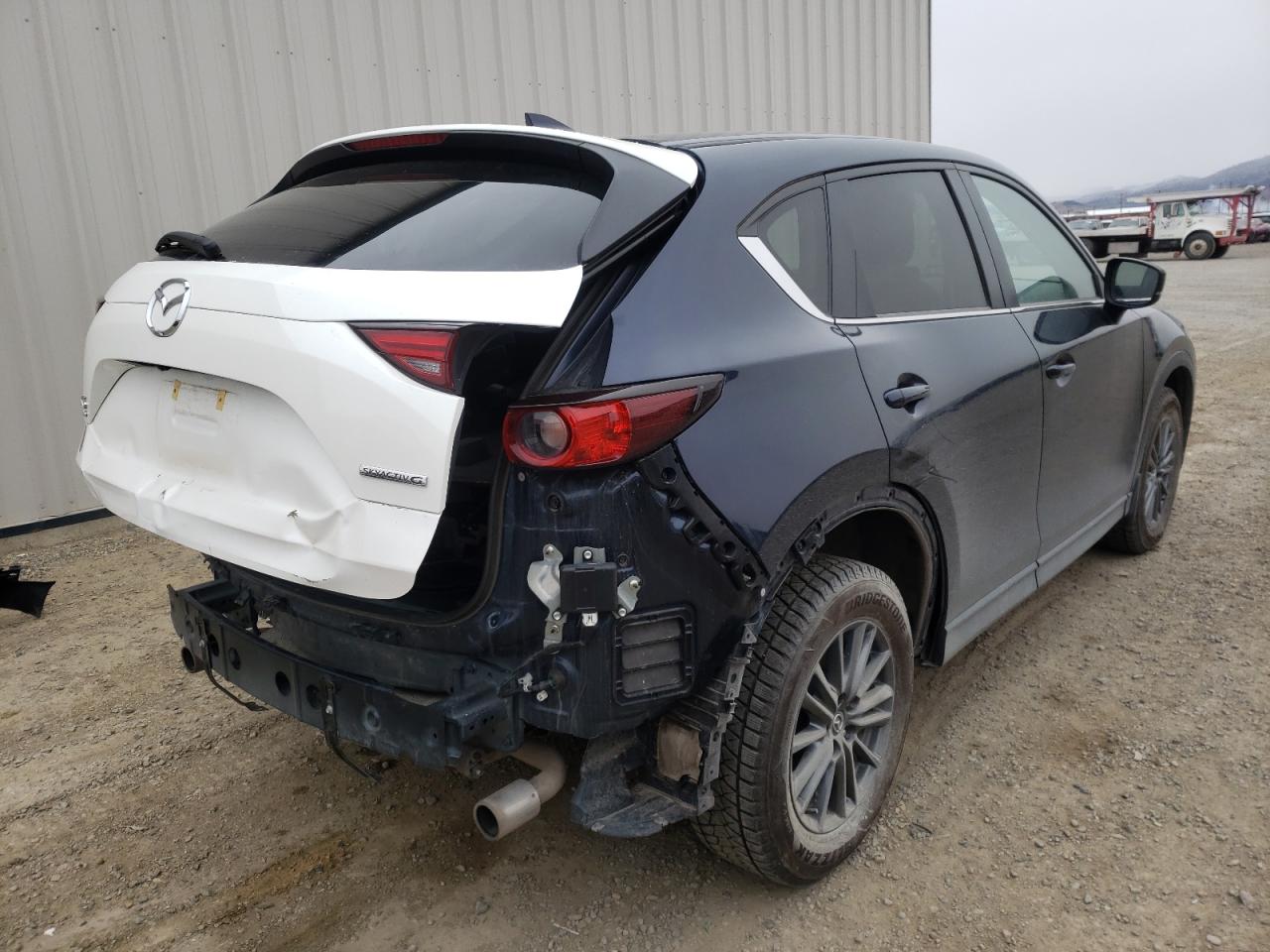 Photo 4 from auction – 2021 MAZDA CX-5 TOURI with VIN JM3KFBCM0M1329063