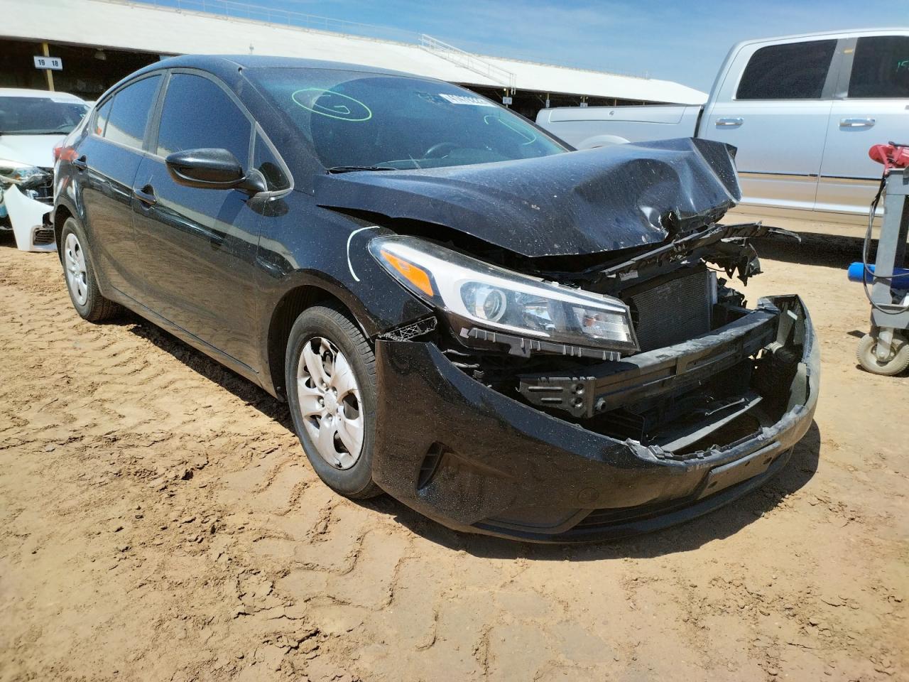 KIA FORTE LX 2017 with VIN 3KPFK4A79HE157827 - Photo from auction