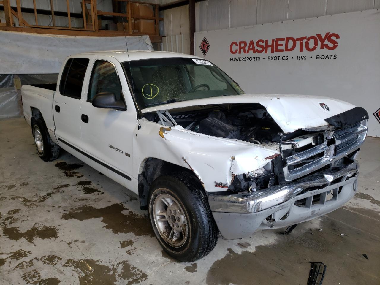 DODGE DAKOTA QUA 2000 with VIN 1B7GL2AX2YS681632 - Photo from auction