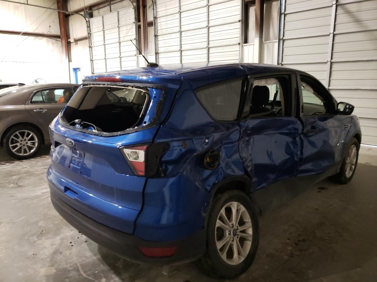 Photo 4 from auction – 2018 FORD ESCAPE S with VIN 1FMCU0F75JUD36660