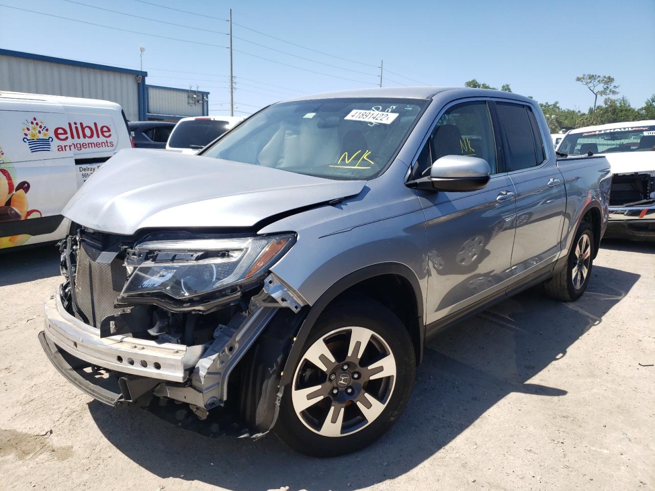 Photo 2 from auction – 2017 HONDA RIDGELINE with VIN 5FPYK2F55HB007705