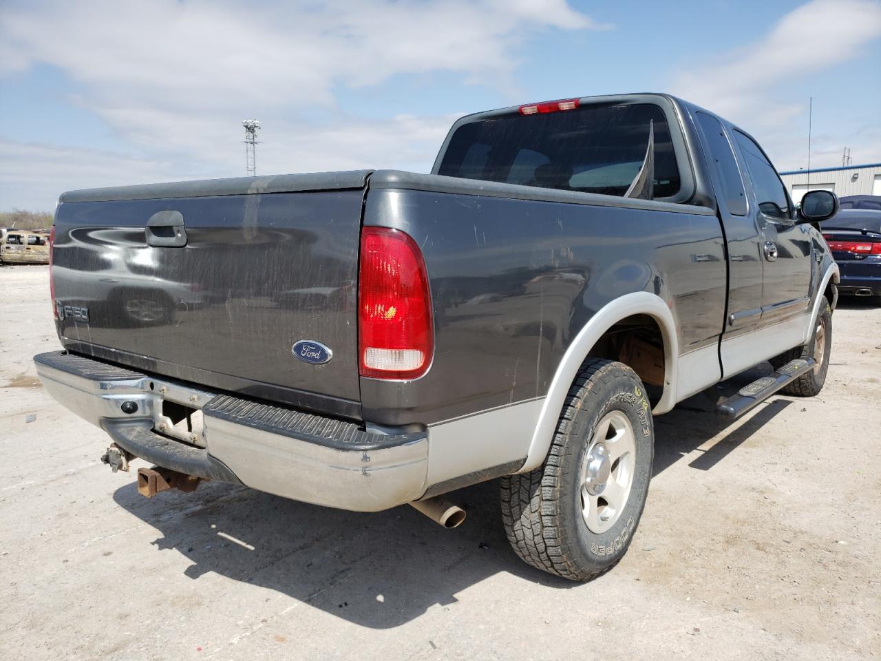 Photo 4 from auction – 2002 FORD F150 with VIN 1FTRX18L32NA84909