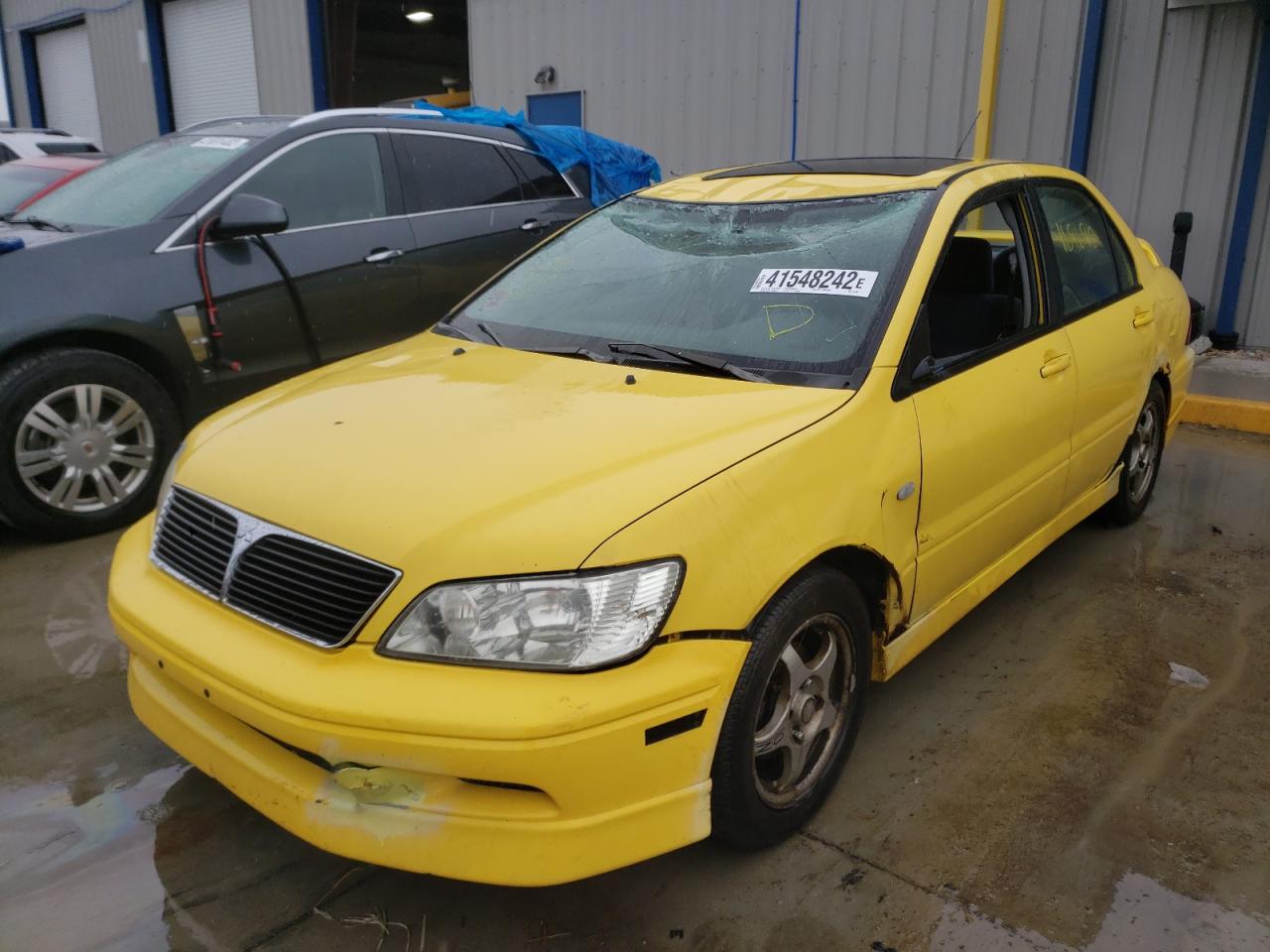Photo 2 from auction – 2003 MITSUBISHI LANCER OZ with VIN JA3AJ86EX3U032100