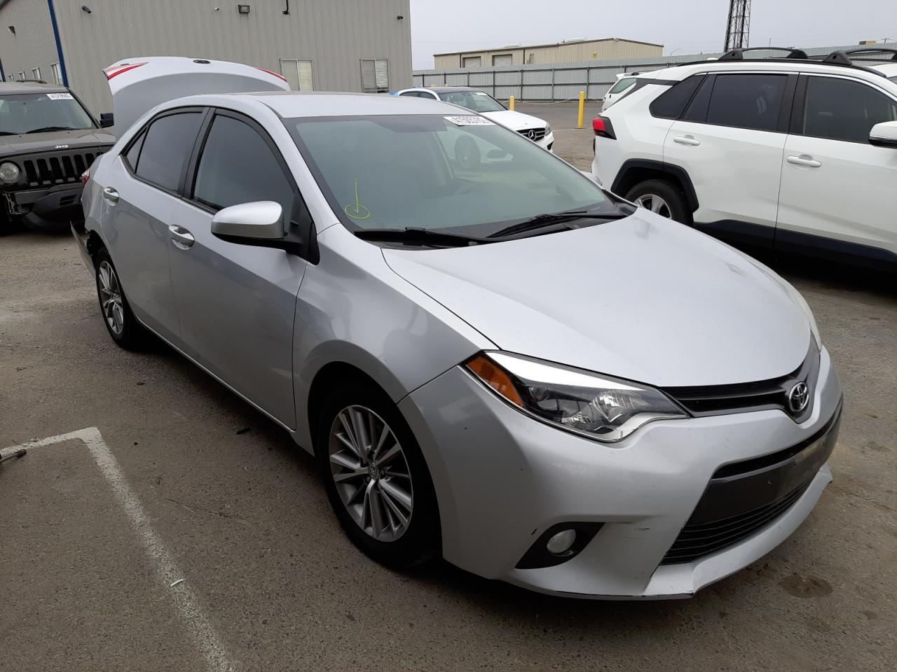 TOYOTA COROLLA L 2015 with VIN 2T1BURHE4FC271899 - Photo from auction