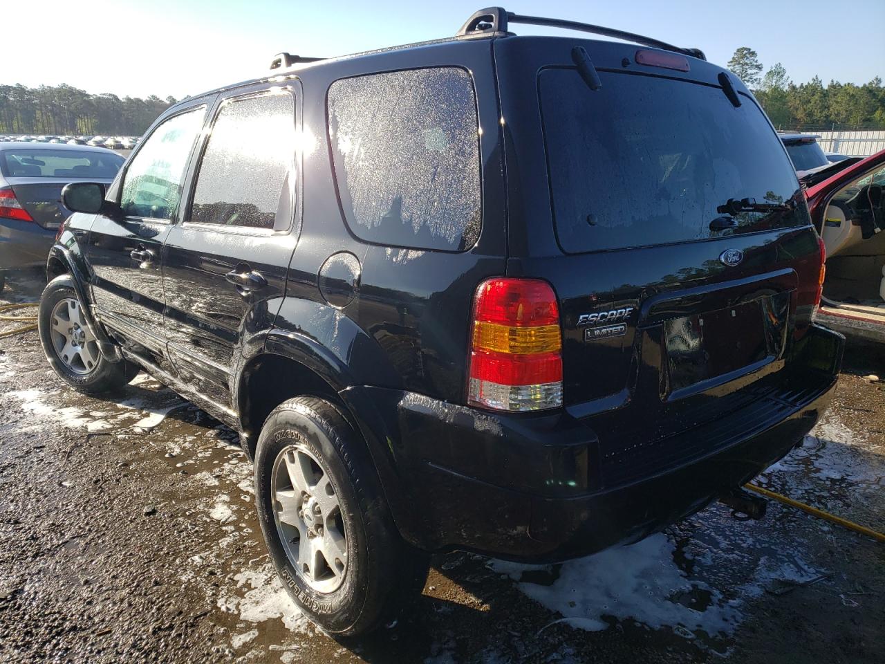 Photo 3 from auction – 2003 FORD ESCAPE LIM with VIN 1FMCU94113KE11209