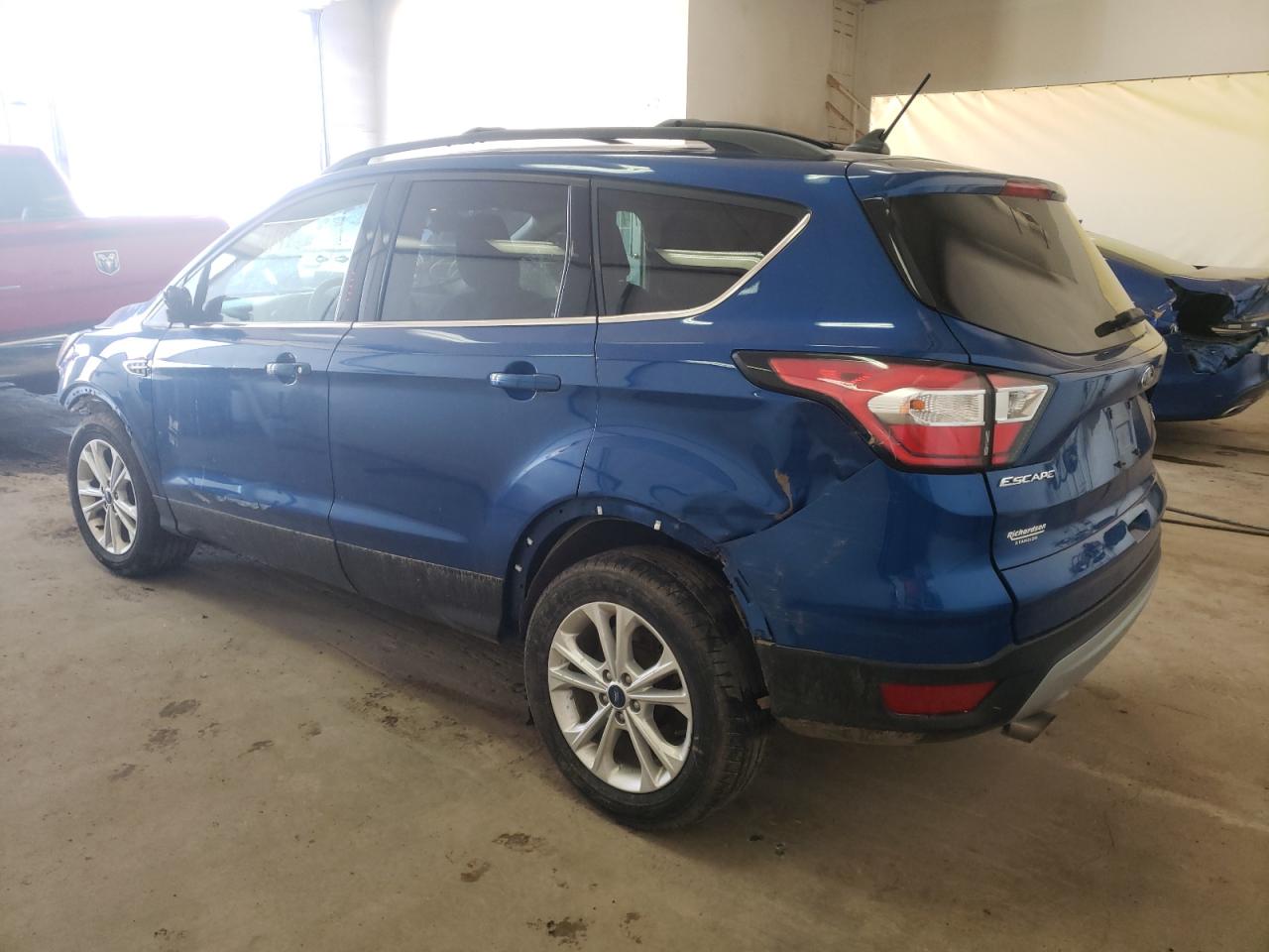 Photo 3 from auction – 2018 FORD ESCAPE SE with VIN 1FMCU0GD2JUA96181