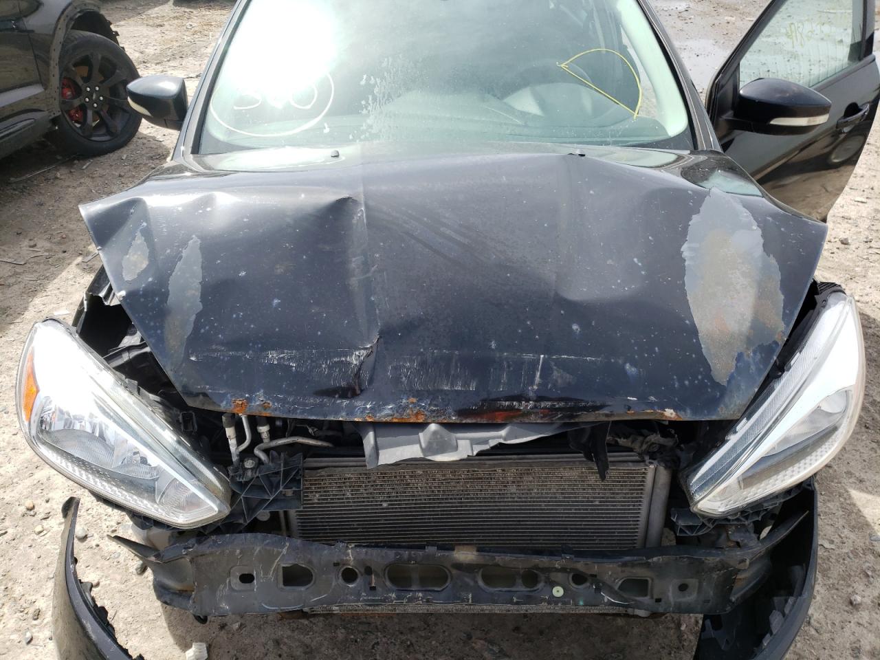 Photo 7 from auction – 2016 FORD FOCUS SE with VIN 1FADP3F24GL224829