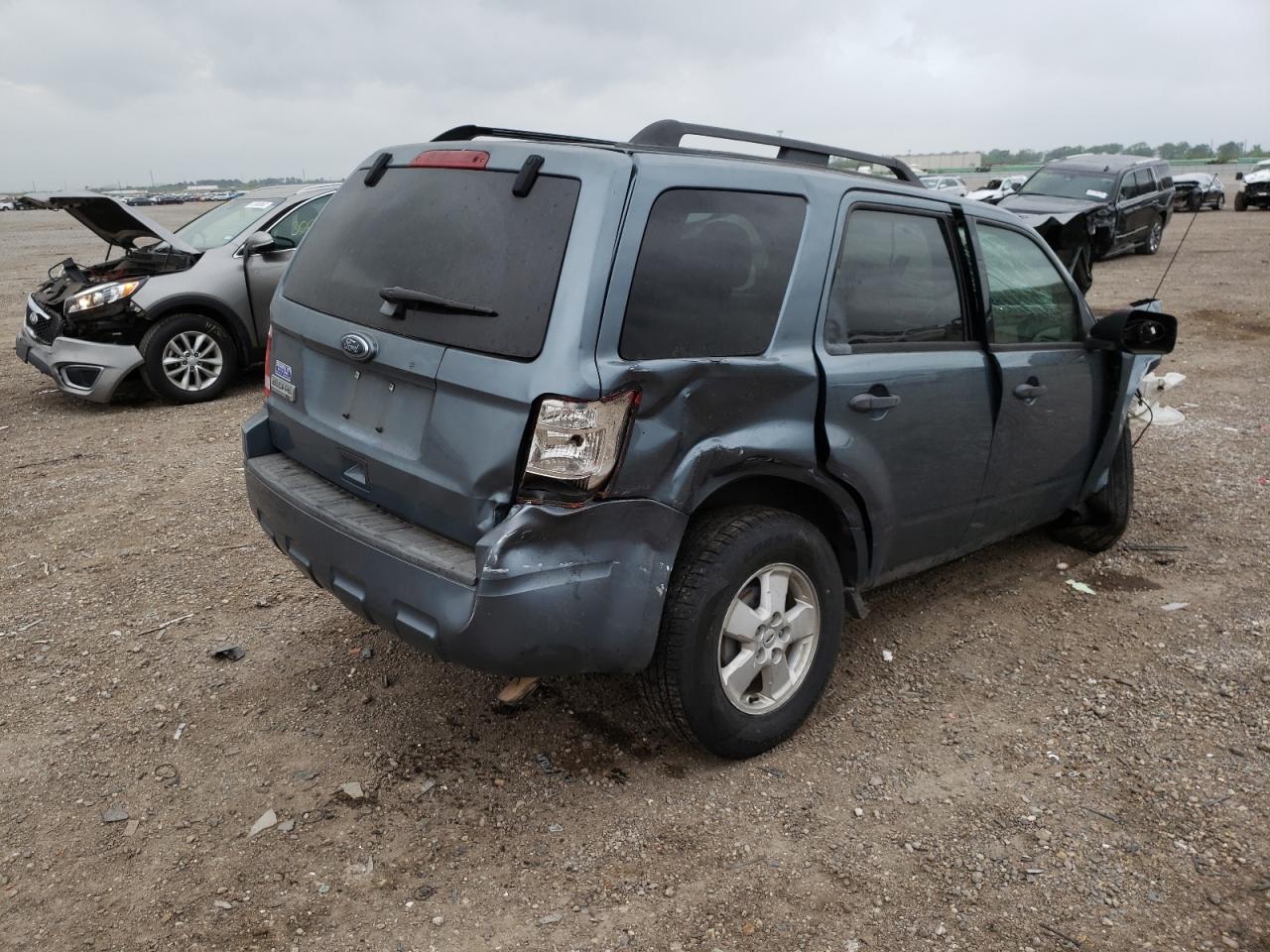 Photo 4 from auction – 2011 FORD ESCAPE XLT with VIN 1FMCU0D76BKA14299