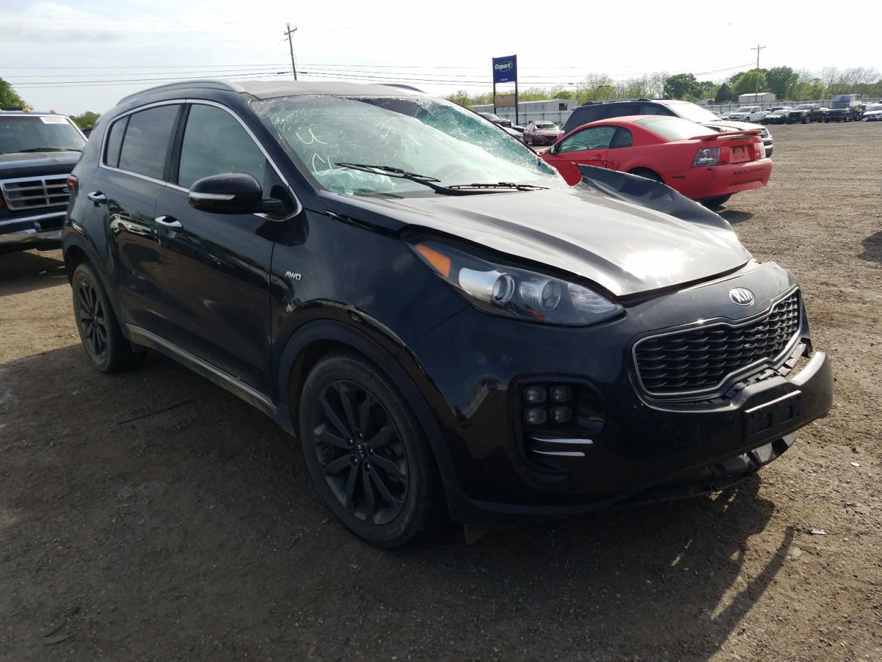 KIA SPORTAGE E 2018 with VIN KNDPNCAC5J7441965 - Photo from auction