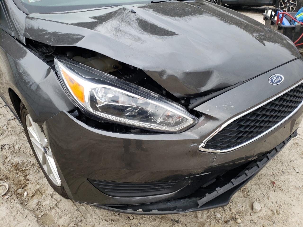 Photo 9 from auction – 2017 FORD FOCUS SE with VIN 1FADP3F2XHL212153