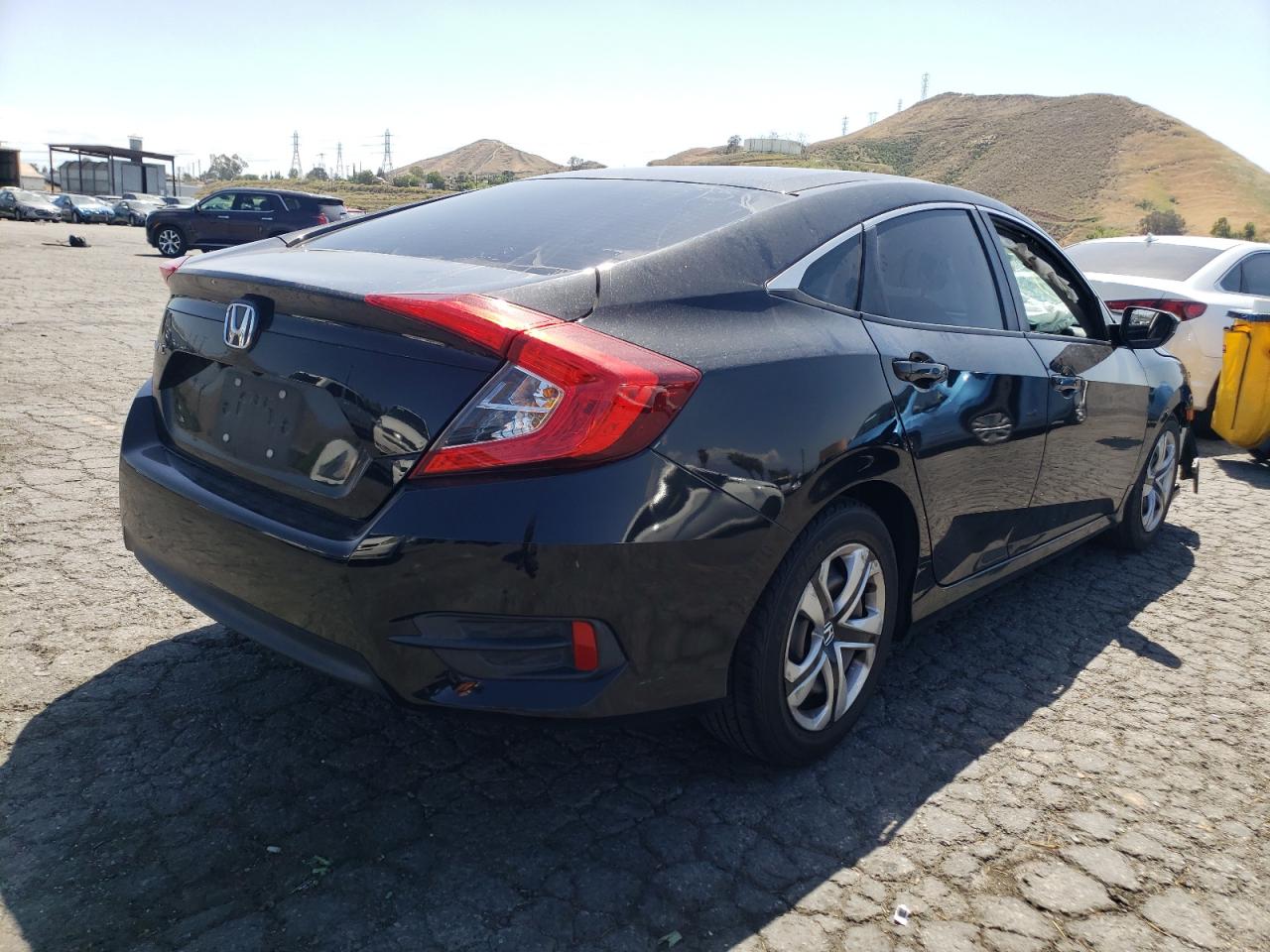 Photo 4 from auction – 2016 HONDA CIVIC LX with VIN 2HGFC2F54GH552155