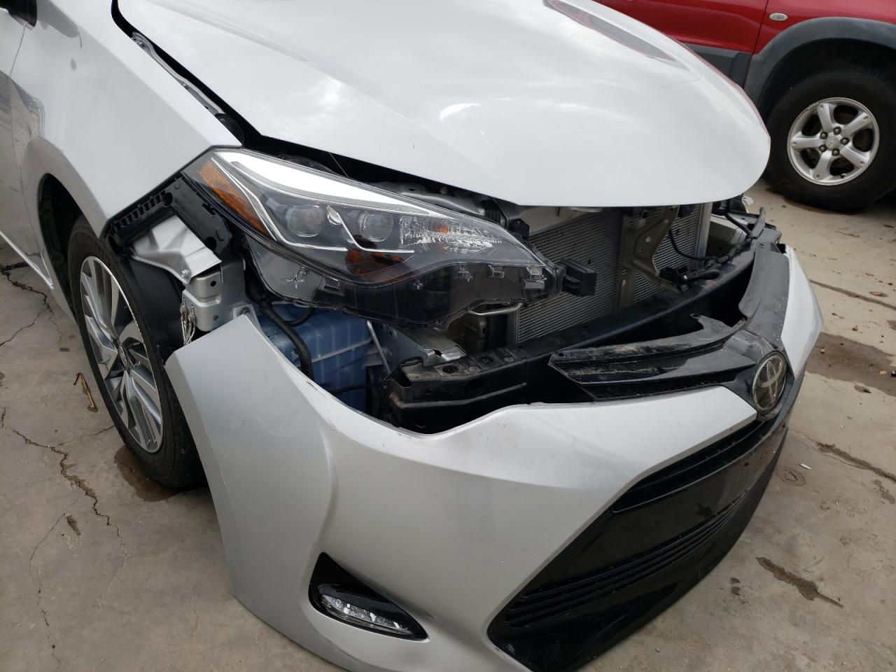 Photo 9 from auction – 2018 TOYOTA COROLLA L with VIN 5YFBURHEXJP807814