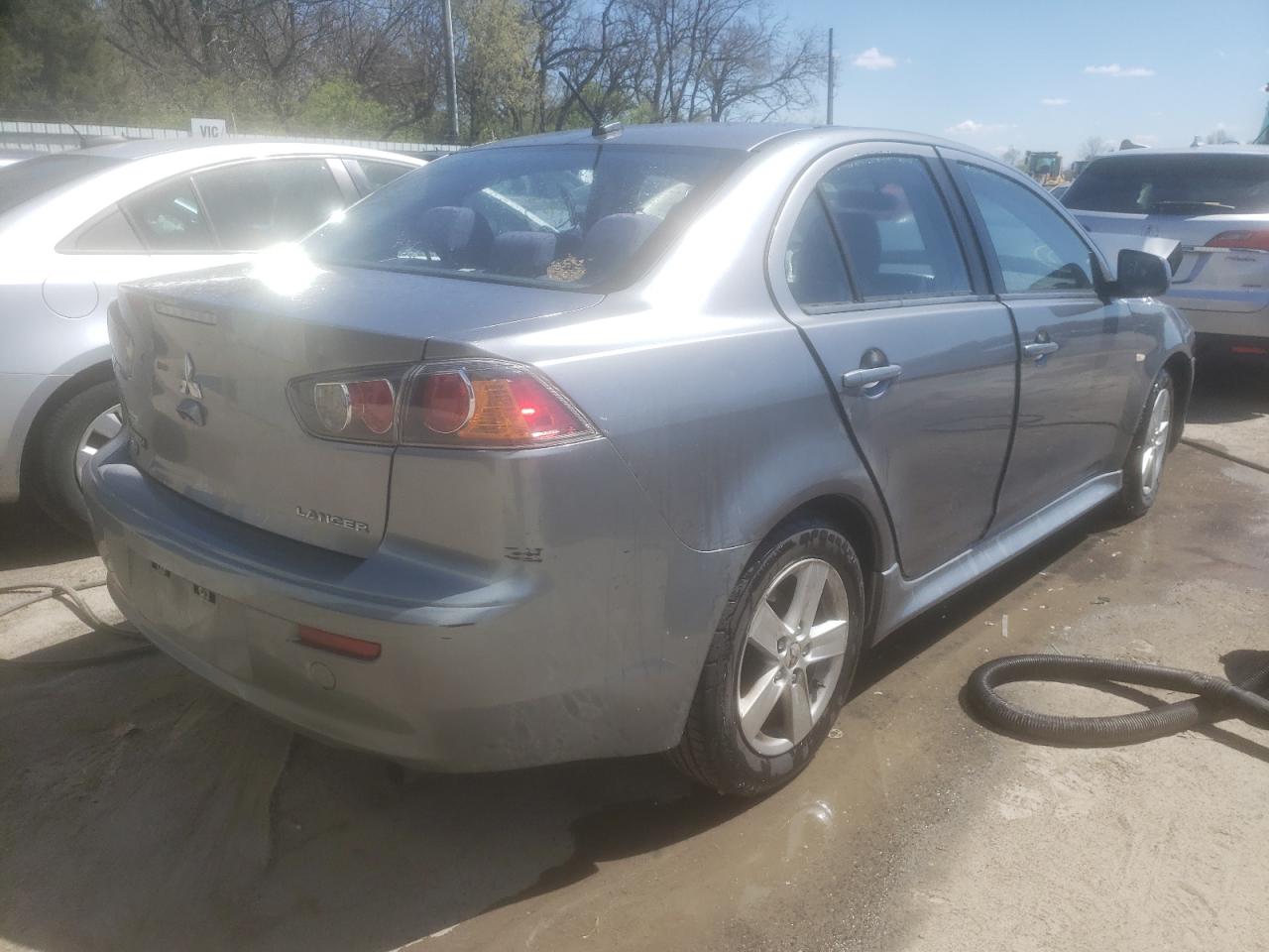 Photo 4 from auction – 2014 MITSUBISHI LANCER SE with VIN JA32V2FW5EU008627