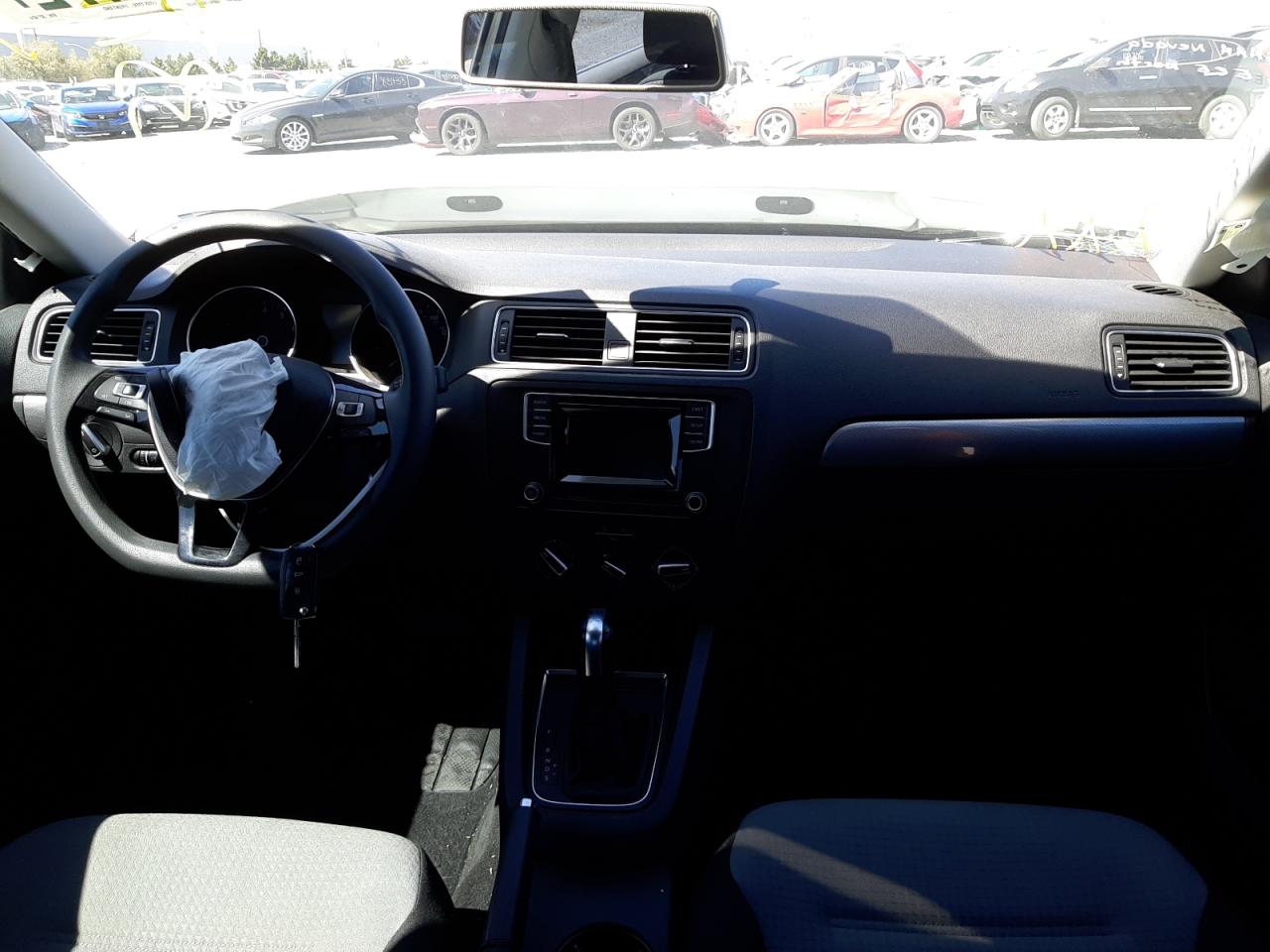 Photo 9 from auction – 2017 VOLKSWAGEN JETTA S with VIN 3VW2B7AJ7HM327424