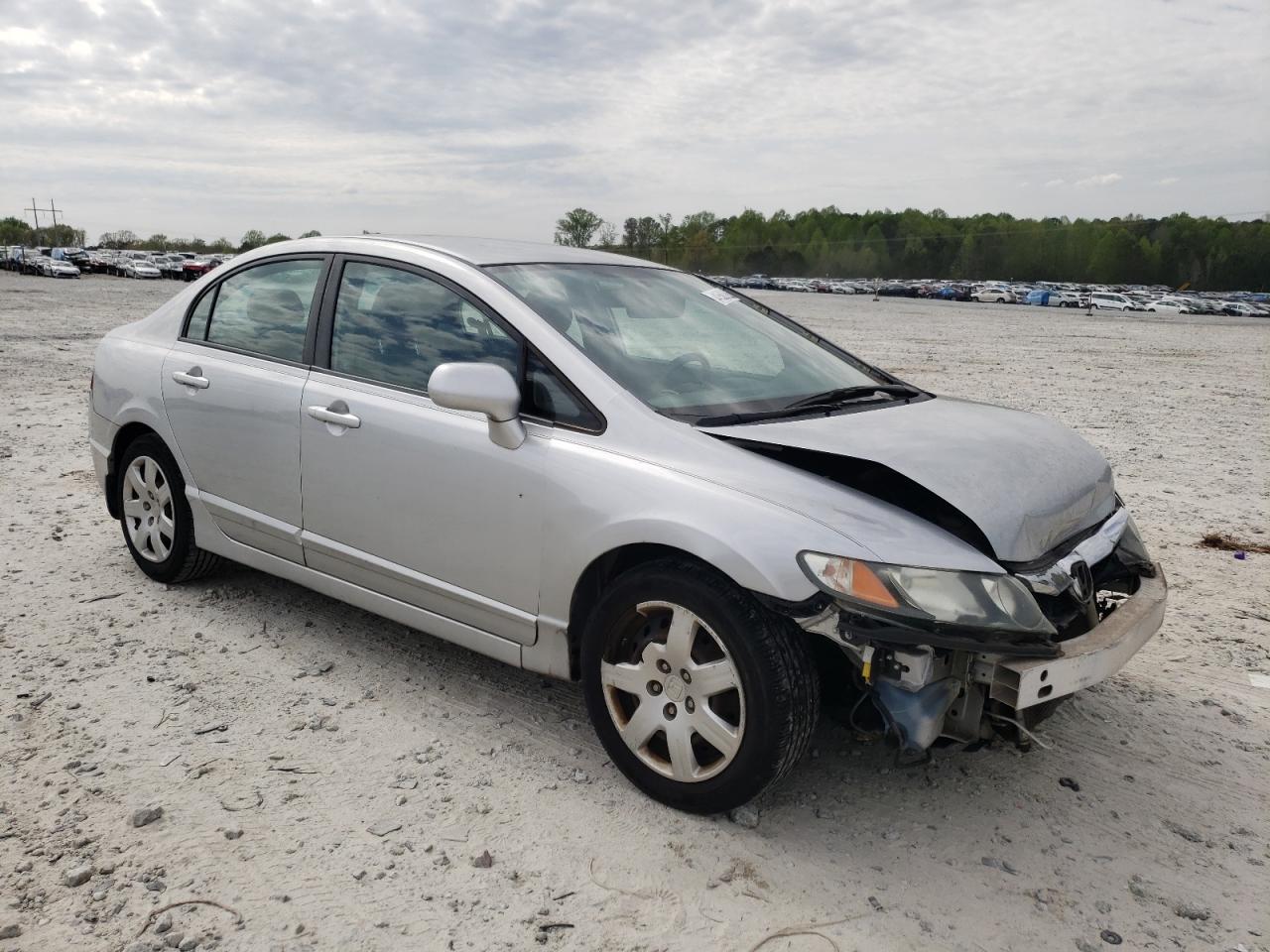 HONDA CIVIC LX 2011 with VIN 2HGFA1F57BH503377 - Photo from auction