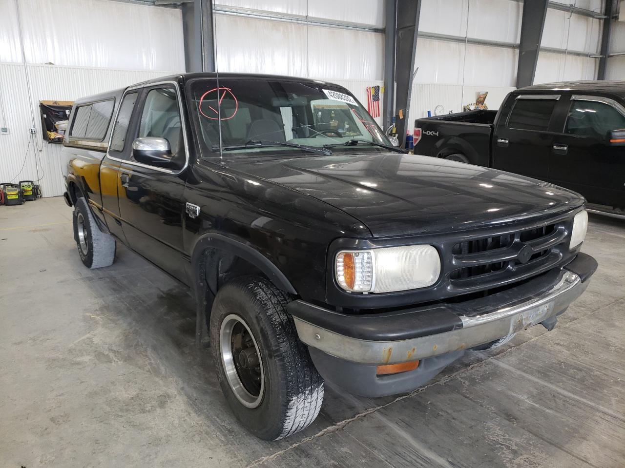 MAZDA B4000 CAB 1994 with VIN 4F4DR17X6RTN04717 - Photo from auction