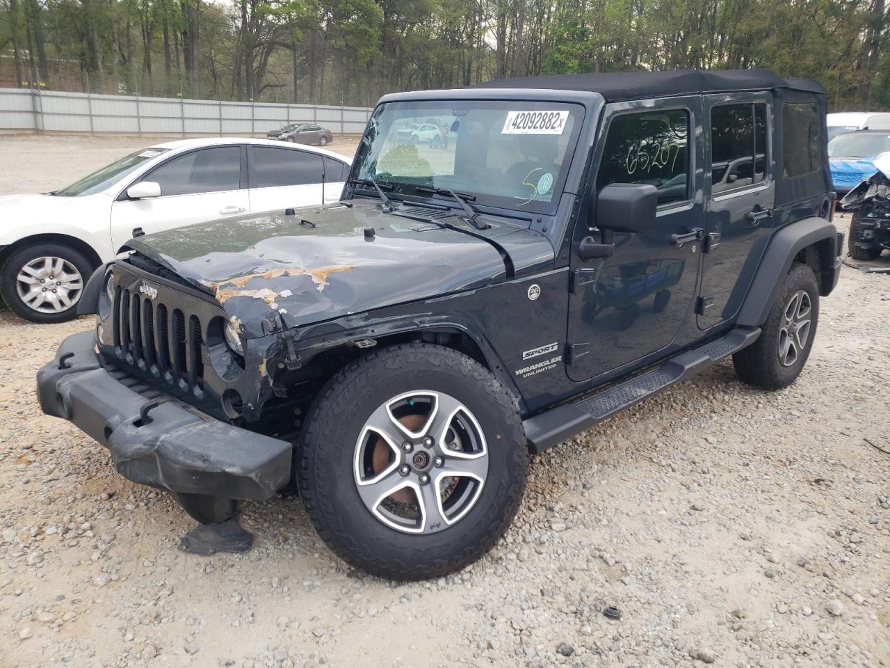 Photo 2 from auction – 2017 JEEP WRANGLER U with VIN 1C4BJWDG3HL673343