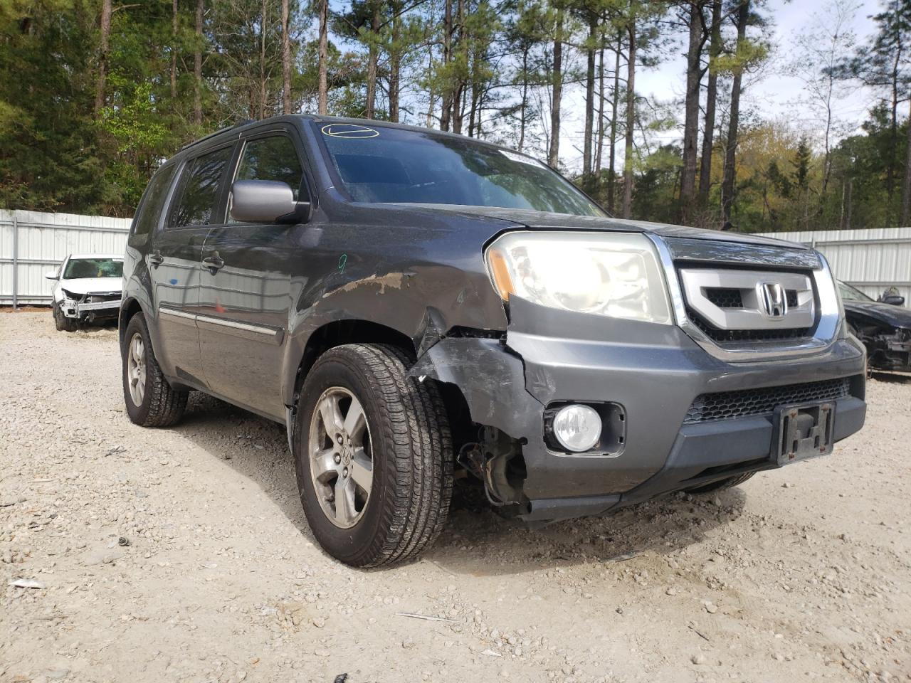 HONDA PILOT TOUR 2010 with VIN 5FNYF4H95AB019500 - Photo from auction