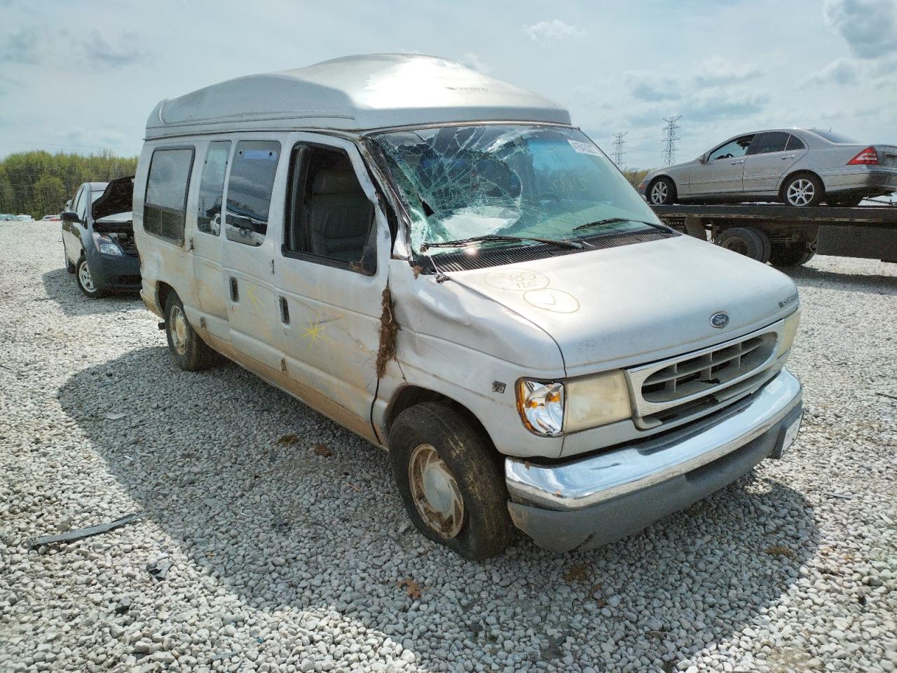 FORD ECONOLINE 1999 with VIN 1FDRE14W0XHB49187 - Photo from auction