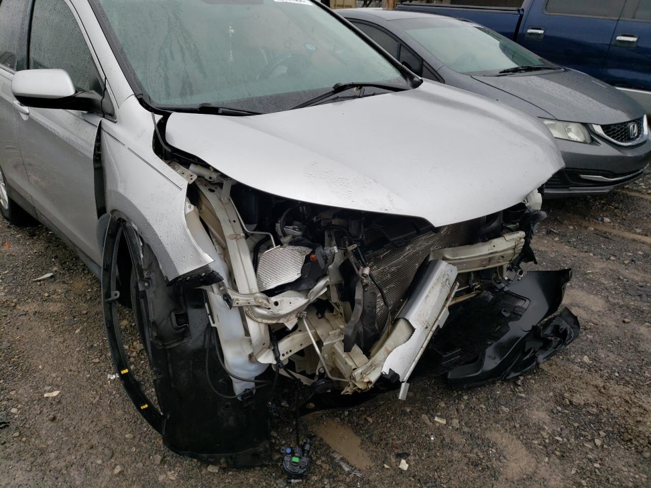 Photo 9 from auction – 2012 HONDA CR-V EXL with VIN 5J6RM3H79CL028259