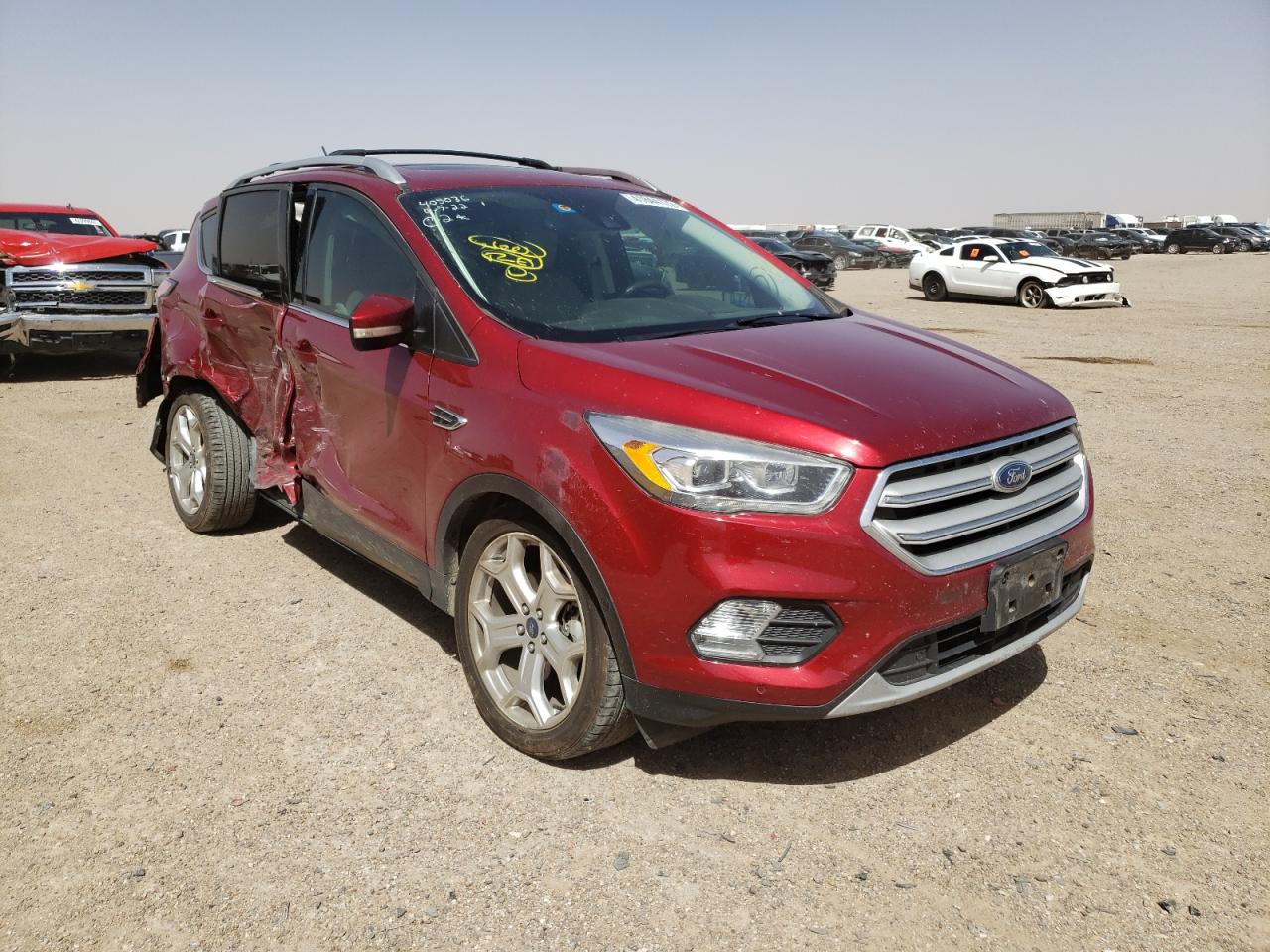FORD ESCAPE TIT 2018 with VIN 1FMCU0J93JUA22515 - Photo from auction