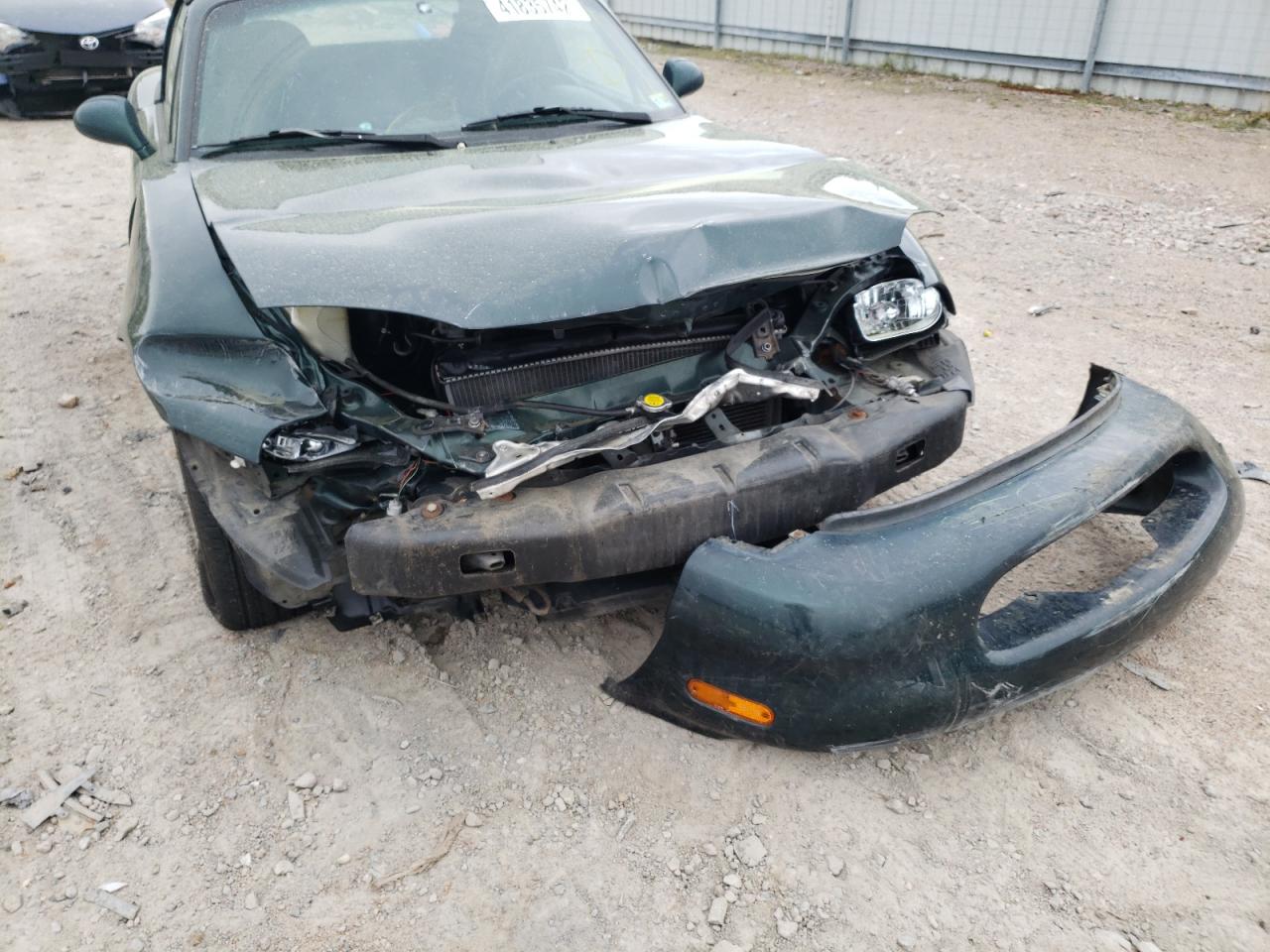Photo 9 from auction – 1999 MAZDA MX-5 MIATA with VIN JM1NB3534X0136713