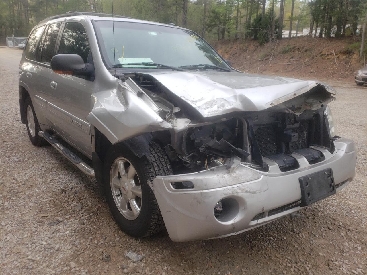 GMC ENVOY 2004 with VIN 1GKDT13S042180557 - Photo from auction