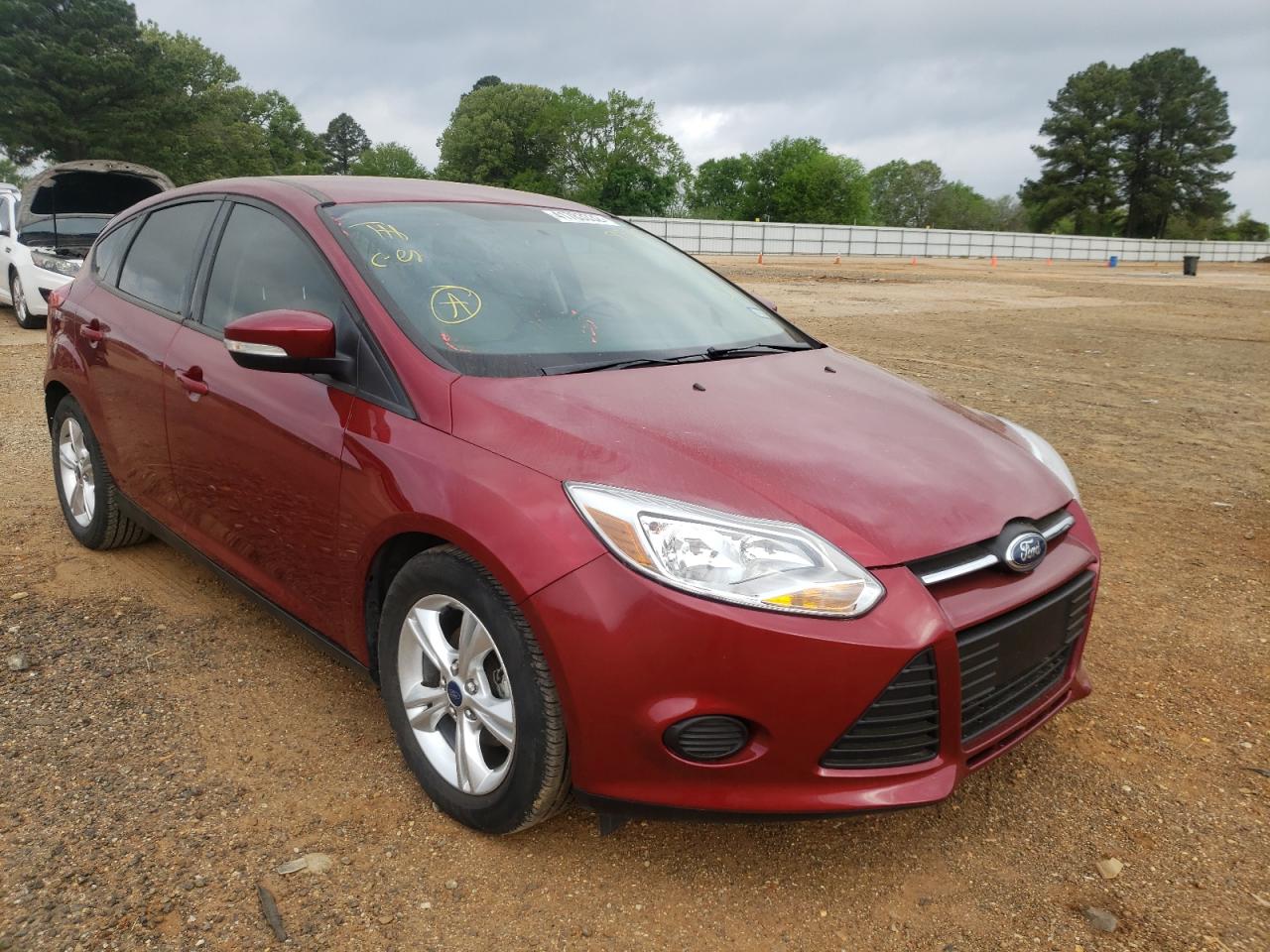 FORD FOCUS SE 2014 with VIN 1FADP3K26EL389820 - Photo from auction