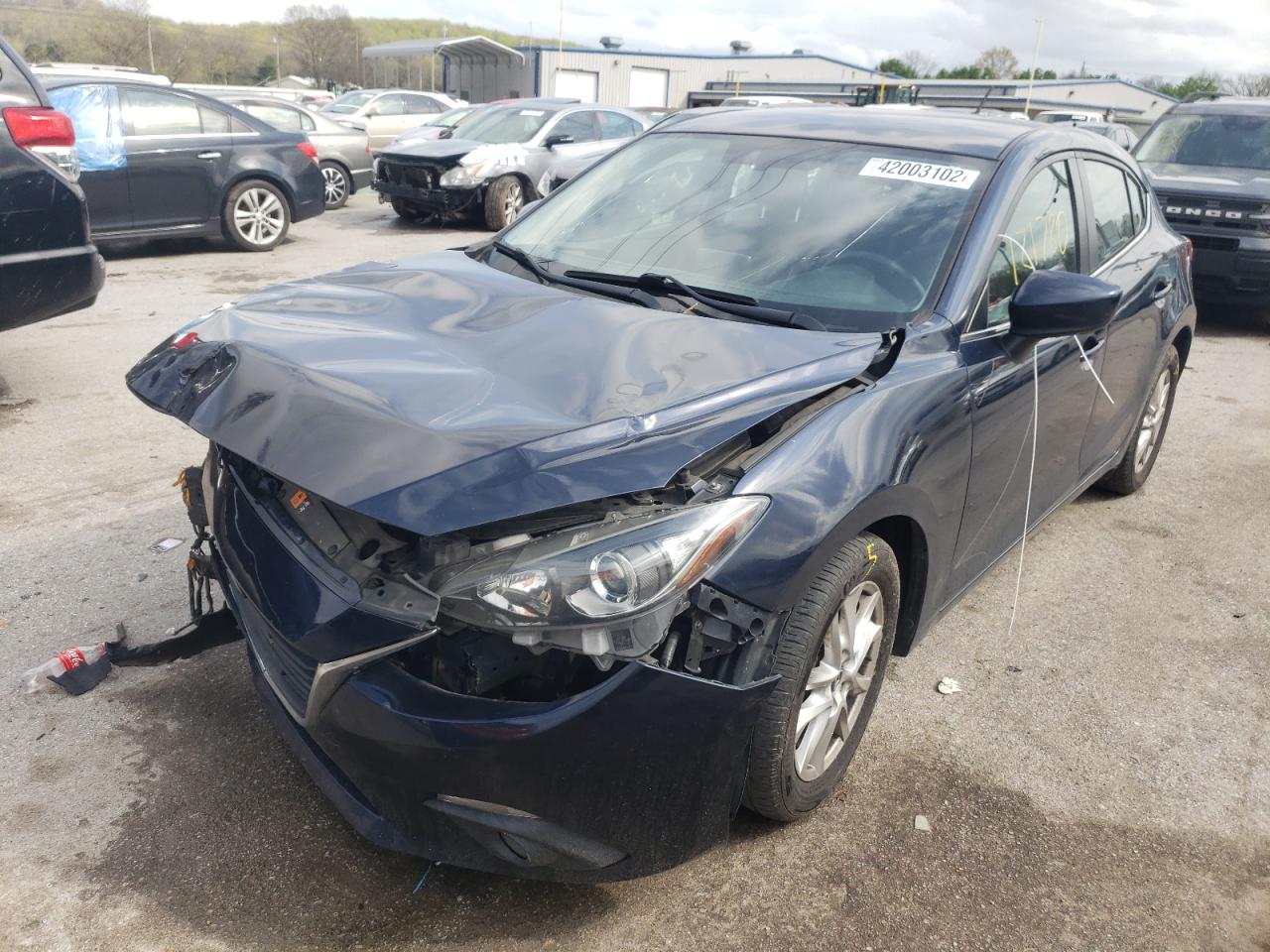 Photo 2 from auction – 2015 MAZDA 3 TOURING with VIN 3MZBM1L75FM189405